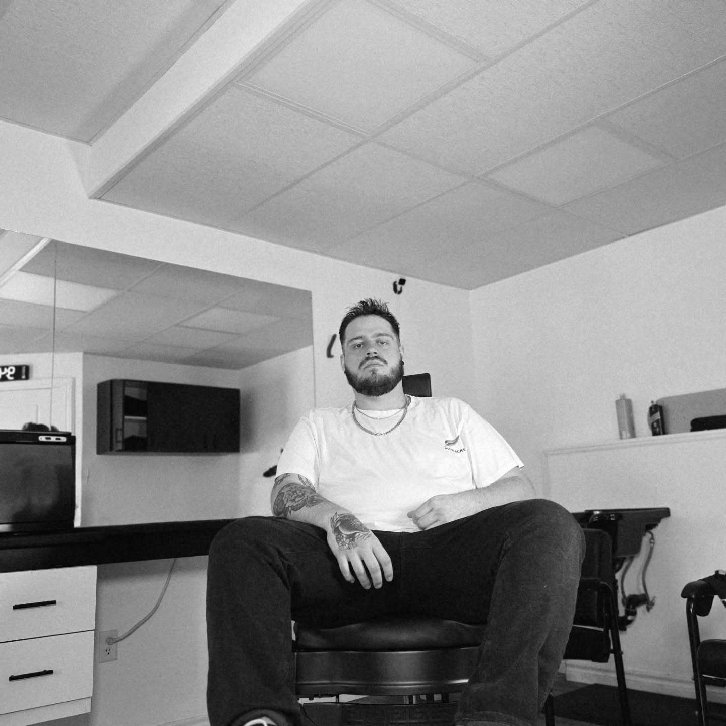 Talon seated in the barber chair