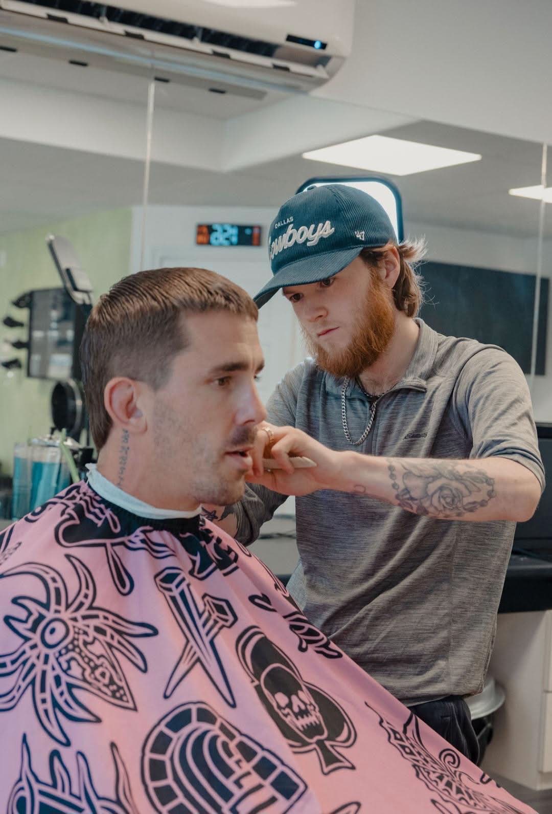 Trimming the moustache line with a trimmer