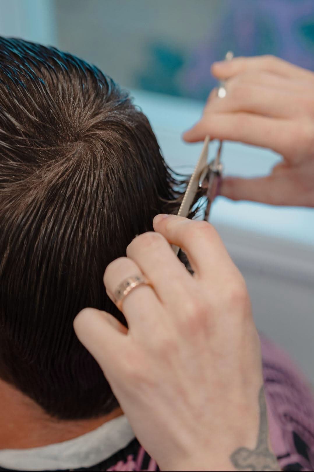 Scissor work over the comb